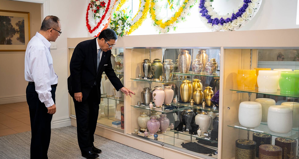 Universal Chung Wah funeral director helping a man