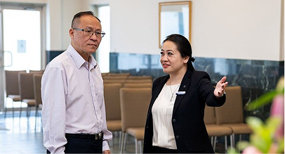 Universal Chung Wah funeral director helping a man