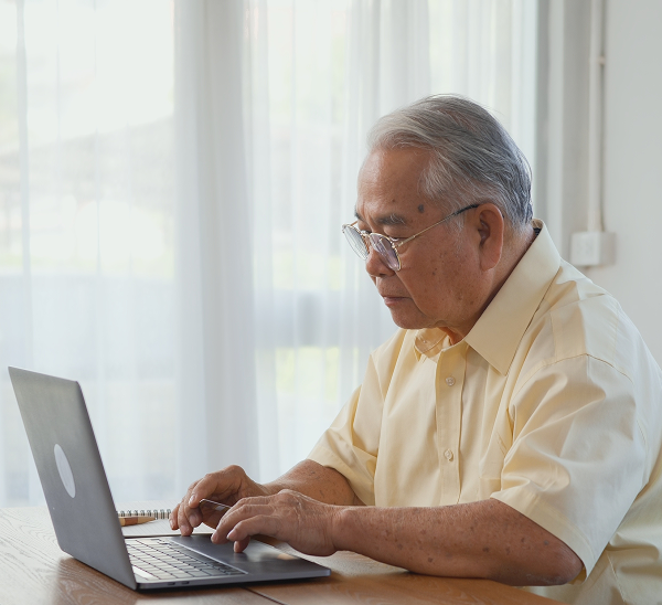man looking at laptop